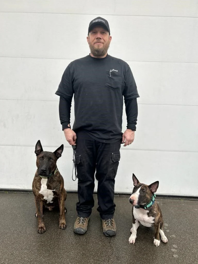 Craig with his two dogs